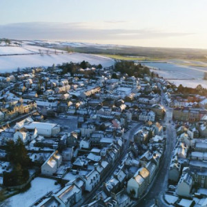 A still from a drone filming video of Bield's Turnbull court developement