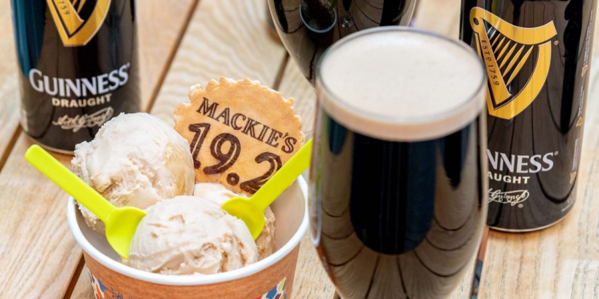 Scoops of the Guinness sorbet surrounded by pints of Guinness brandished with a 19.2 Mackie's wafer