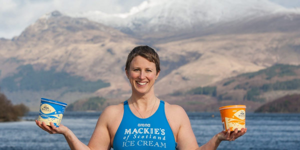 Jade Perry is pictured at Loch Lomond at Luss, Scotland balancing tubs of Mackie's ice cream captured by Food and Drink PR photography