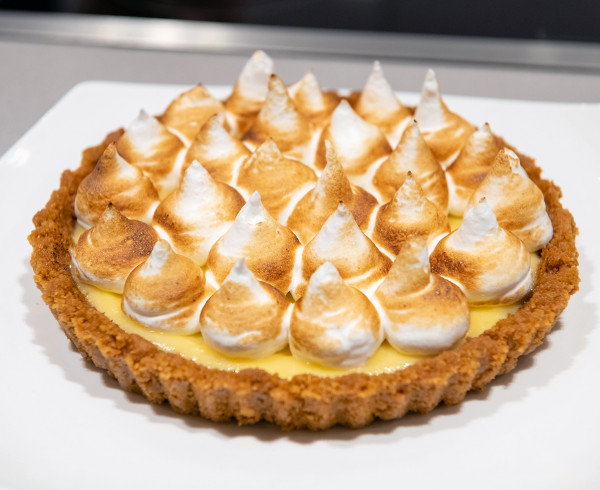 Ruby Bhogal's lemon meringue pie is pictured at an influencer event at The Crescent
